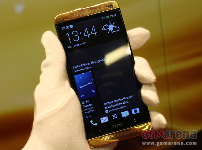 http://cdn.gsmarena.com/pics/13/10/htc-one-gold-hands-on/big.jpg