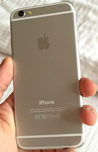 clear if this is the white or gold version of the iPhone 6 (the white ...